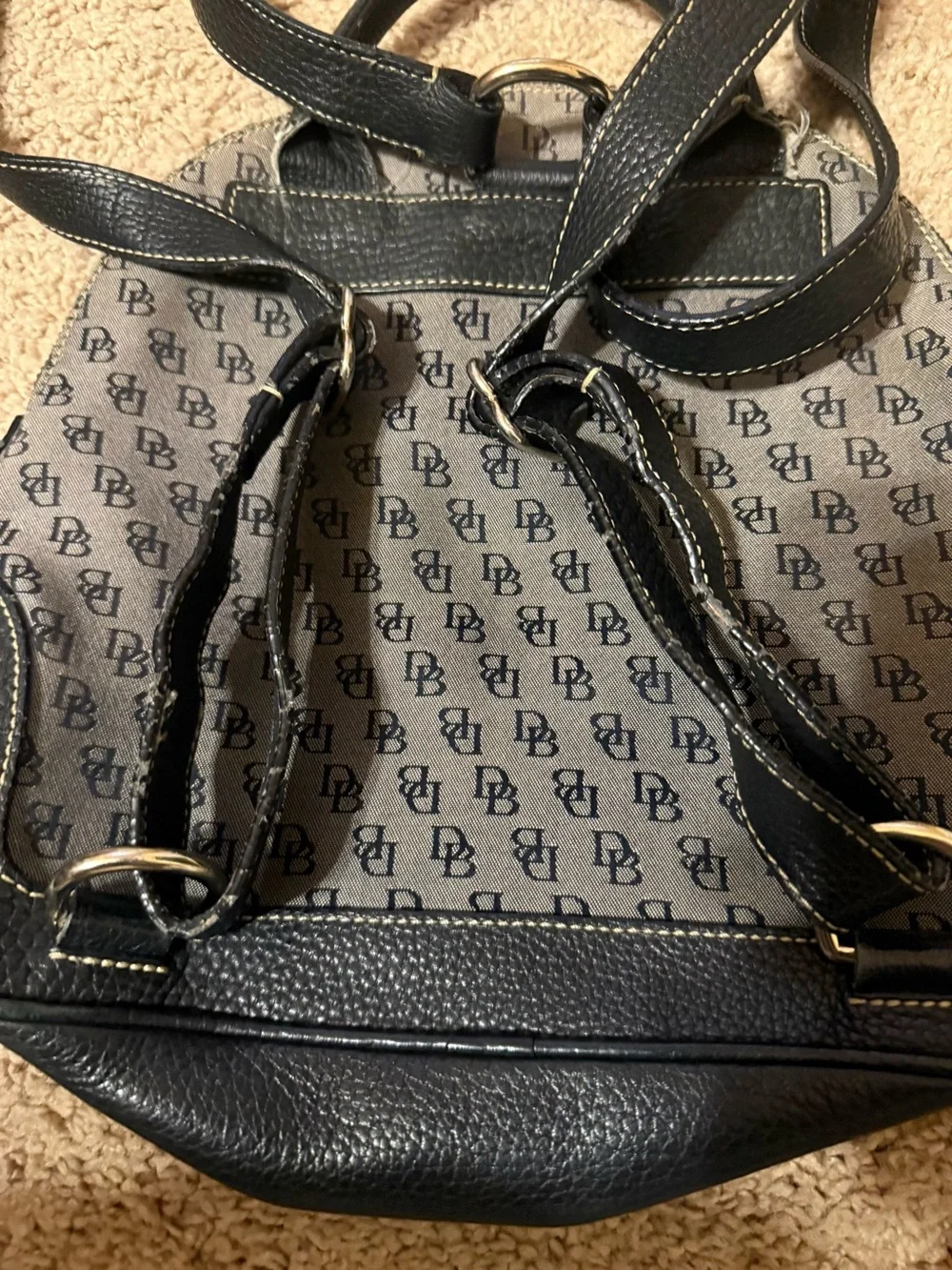Dooney and Bourke Monogram Canvas and Black Leather Backpack